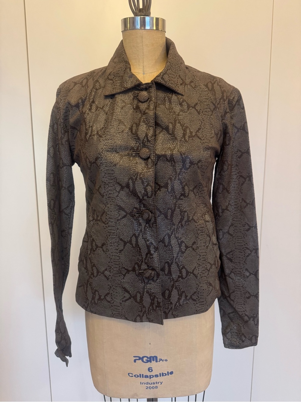 Snake Print Button-Front Jacket in Brown and Black. Real leather